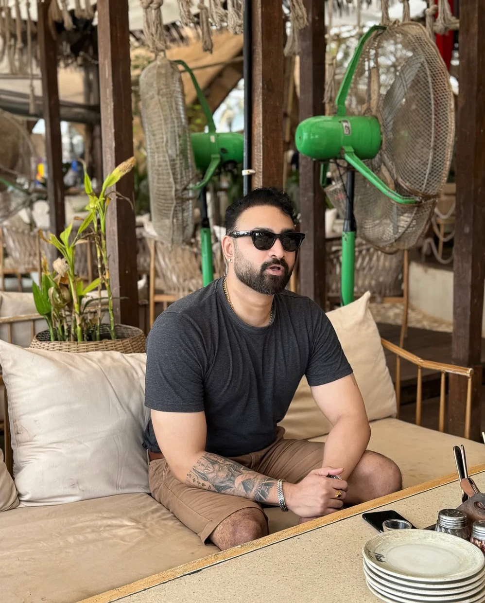 Rahul Warrier relaxing at an open-air coastal cafe lounge in Goa, India